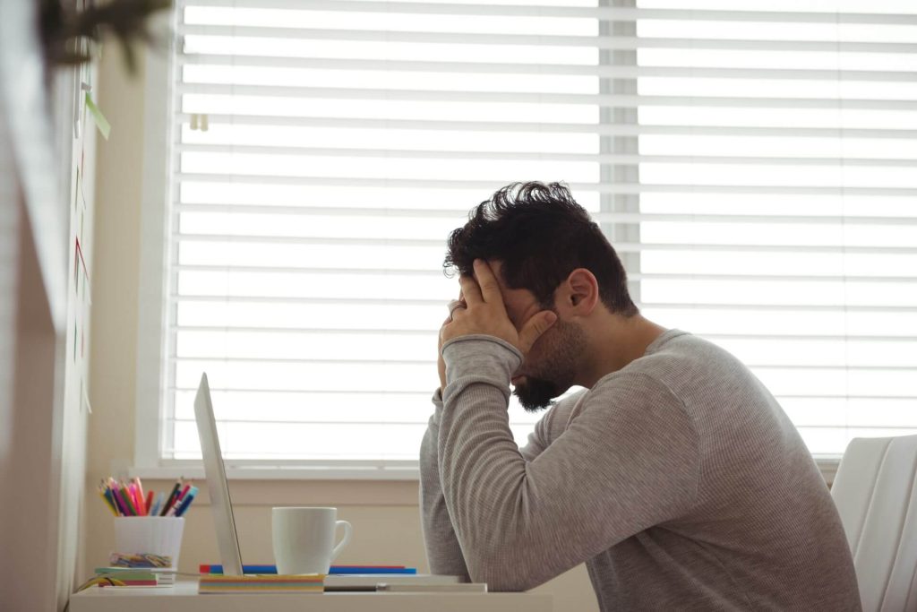 depressed man sitting ketamine infusion in bradenton 1